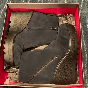 Navy wedge booties
